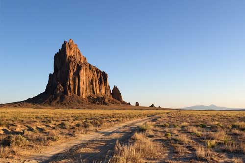 https://www.navajoblue.com/wp-content/uploads/2022/04/attractions-ship-rock.jpg